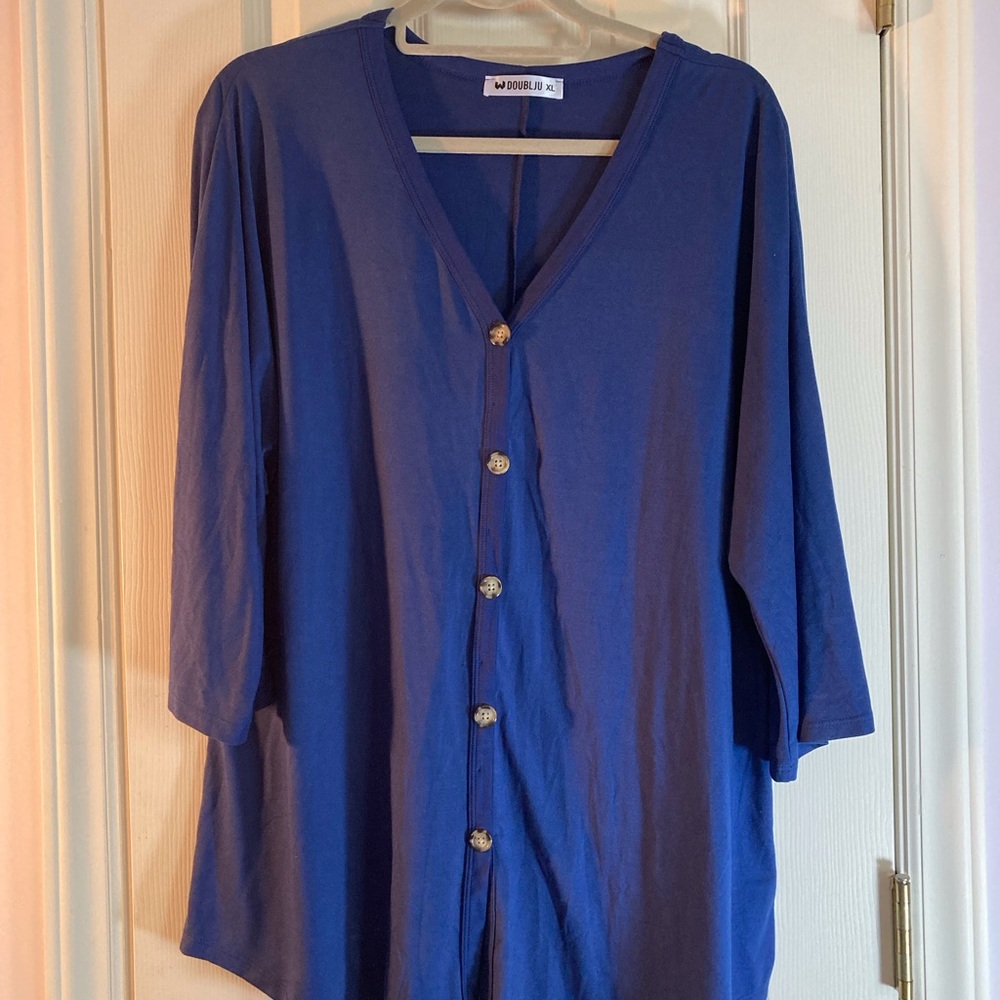 Bright blue/navy knit top. XL never worn